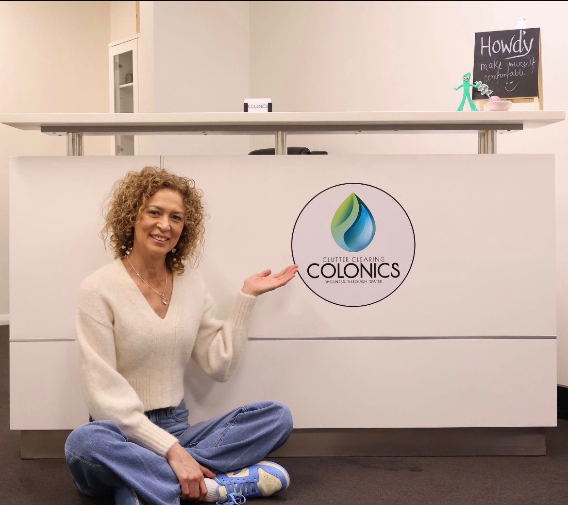 Sara at Clutter Clearing Colonics reception desk Liverpool